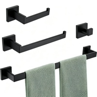 Ensemble d'accessoires de salle de bain noir mat : porte-serviettes, crochets pour peignoirs, porte-papier toilette mural