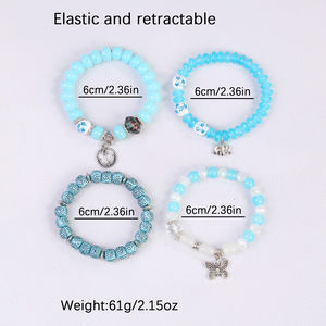 Venta al por mayor Retro bohemio acrílico cuentas joyería mariposa elefante encanto pulsera con colgantes para niña - Product Image 2