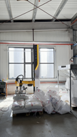 Robot de déballage automatique, machine à basculer les sacs PE de 25 kg, station de remplissage de sacs jumbo, système de transfert de granulés de résine
