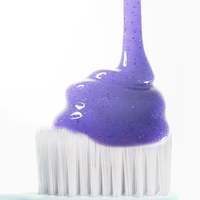 Dentifrice à la menthe fraîche et à l'hydroxyapatite, renforce l'émail, faible teneur en fluorure, avec pâte violette blanchissante et billes de blanchiment