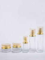 Flacon cosmétique cylindrique en verre transparent avec couvercle doré de 100 ml, design unique, pour crème, lotion, essence, emballage de maquillage