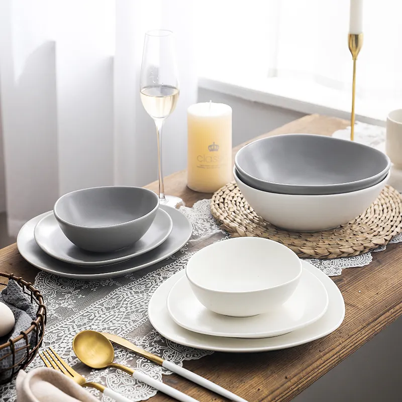 Wholesale christmas nordic style unique design pebble shape matte dinner table set dinner set ceramic plate and bowl