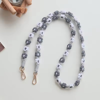 2026 Longue chaîne de suspension tendance avec anneau, cordon de poignet universel pour téléphone portable avec clip, motif fleur de marguerite en corde tressée