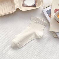Chaussettes pour femmes en coton doux et confortable de couleur unie, vente en gros d'usine