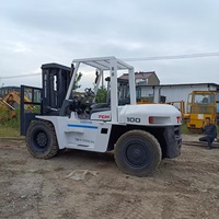 Montacargas Usado TCM FD100 de 10 Toneladas con Desplazador Lateral Hidráulico, Neumáticos Sólidos, Interfaz de Control Humanizada, Motor Diésel de Dos Etapas