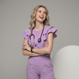 Conjuntos de Uniformes Médicos Premium Personalizados Bestex para Mujer, Pantalones Jogger Elásticos de Moda, Traje de Enfermería con Logotipo - Product Image 1