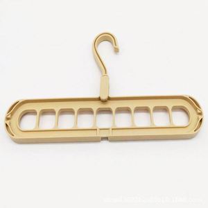 Organizador de Ropa Plegable Multifuncional de Plástico Sostenible de un Solo Nivel con Nueve Orificios, Estante de Almacenamiento para Armario, Colgador Mágico para Balcón - Product Image 4