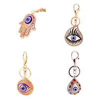 Nouveau Style de porte-clés en métal avec strass mauvais œil, accessoires de voiture, cadeaux promotionnels pour les consommateurs