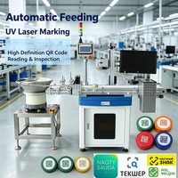 Machine de marquage laser UV à alimentation par bol vibrant avec téléchargement de données pour les bouchons de bouteilles de boissons et de cosmétiques