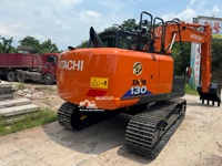 Excavatrice sur pneus d'occasion Hitachi ZX 130 de 13 tonnes, 98% neuve, excellente qualité, en stock