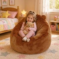 Fauteuil pouf Helios au design moderne en forme d'ours, avec dossier capitonné portable et sécurisé, idéal pour les enfants et les salons.