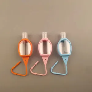 Plastik şişe tedarikçileri Mini sıvı sabun konteyner 30ml boş plastik şampuan jel şişe anahtarlık ile silikon tutucu