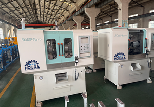 تحميل وتفريغ أوتوماتيكي بالكامل للأطباق الاهتزازية ، ماكينة شطب مزدوجة لقطع غيار السيارات - Product Image 2