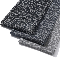 Noir 80% Coton Imprimé Léopard Jacquard Denim Tissu pour Jeans 10.5 Oz Haute Qualité Denim Tissu En Gros
