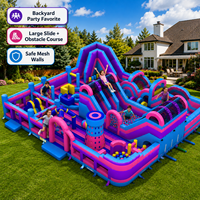 Parcours d'obstacles gonflable géant commercial avec toboggans, piscine à balles et mur d'escalade pour enfants