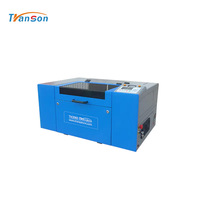Máquina de Grabado Láser CNC de Sobremesa TRANSON para Cuero, Acrílico, Madera, Goma y Más - Refrigerada por Agua de Alta Calidad de Shandong