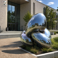 Sculpture en acier inoxydable poli miroir, motif galet, polie à la main, art abstrait pour la décoration extérieure des places publiques, jardins, entrées d'hôtels et aménagements paysagers