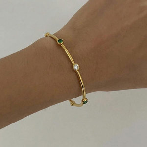 สร้อยข้อมือและกำไลแฟชั่นสแตนเลสสตีล 316L กันน้ำ ไม่หมอง ชุบทอง 14K 18K ประดับเพชรซิร์คอน ดีไซน์เนอร์ สำหรับผู้หญิง - Product Image 1