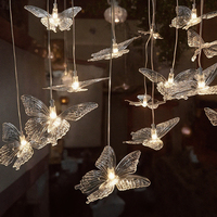 Lustre de plafond en acrylique transparent à 10 têtes, éclairage LED de luxe en forme de papillon pour la décoration de scène de mariage, d'événements et de toiles de fond