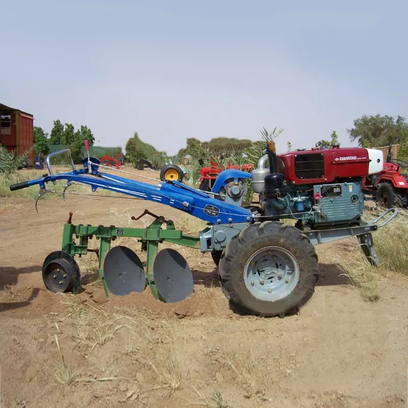 I piccoli trattori agricoli dell'aratro a disco del trattore implementano l'aratro a disco del coltivatore dell'attrezzo per l'erpice a disco del trattore a piedi