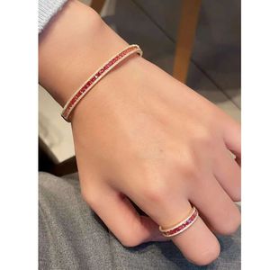 Bracelet jonc tennis Xinfly en or jaune 18 carats avec saphir rose taille princesse et diamants - Product Image 1
