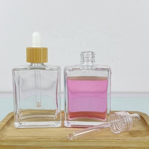 Hot Selling Cosmetic Rectangular <b>Bottle</b> Pink Silk Screen logo 50ml 100ml Essential Oil <b>Bottle</b> with Gold Aluminum <b>Dropper</b> Cap - Product Image 6