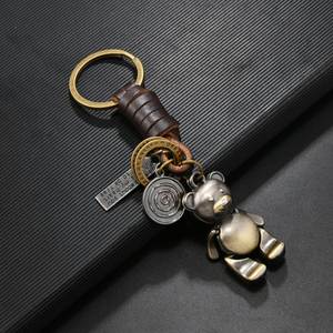 Mini porte-clés en alliage de bronze vintage en forme d'ours, en cuir tressé, pour homme et femme - Product Image 1