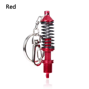 Venta al por mayor de resorte ajustable Mini amortiguador llavero accesorios de coche para regalos - Product Image 6