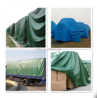 Rouleau de tissu en polyester tissé ignifuge de haute qualité, imperméable, teint en fil uni, coupe-vent et respirant pour bâche de chargement