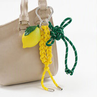 Porte-clés pendentif nœud papillon en corde tressée avec breloque feuille de citron pour accessoire de sac d'été