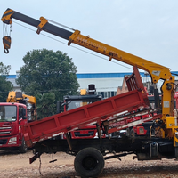 Grue télescopique montée sur camion d'occasion à prix avantageux, 4 tonnes, avec benne basculante pour chantier de construction