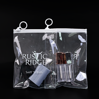 Sac à fermeture éclair en PVC transparent durable avec anneau de traction pour accessoires cosmétiques quotidiens