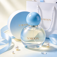 Nouvelle conception, flacon de parfum en verre mignon de 50 ml et 100 ml avec bouchon à bille coloré et boîte, flacon en verre vide personnalisé de 30 ml et 75 ml pour parfum