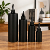 Bouteille en plastique HDPE noire à presser avec bouchon à pointe torsadée, impression de logo personnalisée pour la teinture des cheveux, l'encre de tatouage, les liquides cosmétiques