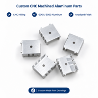 Composants en aluminium 6061/6063 usinés sur mesure par CNC avec trous centraux, fentes latérales et finition anodisée