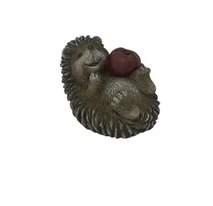Hedgehog holding an apple resin crafts craft resin giftresin craft deer statue home and garden decor