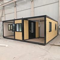Maison conteneur modulaire préfabriquée, style minimaliste moderne, avec porte en verre, studio d'invités extérieur, habitable et extensible