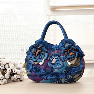 Sac à main coréen tendance pour femme, sac de maman, pochette pour téléphone portable et clés, avec fermeture éclair en dentelle de couleur unie, en polyester Tanjing - Product Image 1