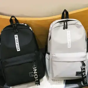 Çin moda büyük kapasiteli 15.6 inç çocuk okul çantası su geçirmez Laptop sırt çantası siyah naylon özel Logo