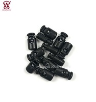 Bouton de verrouillage à ressort en plastique noir robuste avec ressort puissant pour cordons de serrage, lacets et sacs à dos