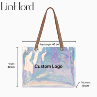 Sac fourre-tout léger en PVC holographique à motif de dessin animé, avec logo personnalisé et longues poignées, idéal pour le shopping quotidien, les trajets en ville et les boutiques de mode.