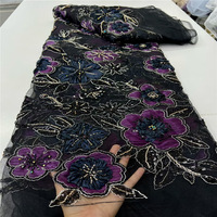 Tissu en dentelle française élégante de haute qualité avec perles faites à la main et maille à sequins pour la création de robes de mariée et de soirée.