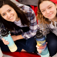 Bouteille en acier inoxydable de sport avec bouchon à bec