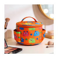Sac cosmétique rond à poignée supérieure, imprimé monstre coloré, poches latérales, organiseur de maquillage pour les voyages et l'usage quotidien