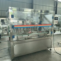 Machine de remplissage de pâtes visqueuses, machine de remplissage automatique de liquides visqueux, machine de remplissage à piston 1 tête avec mélangeur
