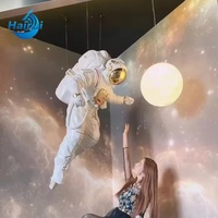 Statue d'astronaute grandeur nature en résine, sculpture d'astronaute en fibre de verre pour la décoration du salon, vente en gros