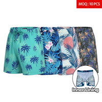 Shorts de bain pour hommes imprimés tropicaux en gros, 150 GSM, séchage rapide, avec doublure et poches, tissu élastique, maillot de bain d'été