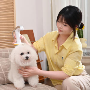 Nouveautés : Kit de toilettage professionnel 2-en-1 pour chiens et chats, avec poignée confortable et machine intégrée de séchage et de démêlage des poils pour animaux. - Product Image 1