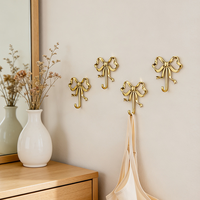 Crochet mural en métal de luxe léger, motif nœud, pour salon et salle de bain, crochet décoratif pour suspendre les manteaux, crochet mural en métal à fixer par perçage