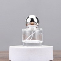 Flacons de parfum en verre transparent élégants de haute qualité, 30 ml, 50 ml, 100 ml, côtés lisses, forme cylindrique, pompe sérigraphiée